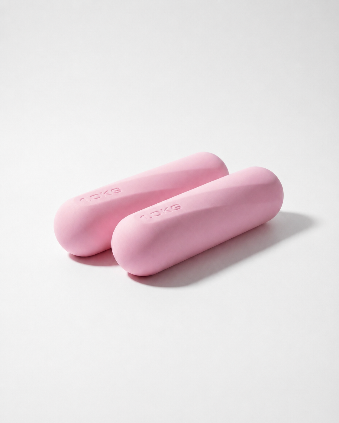 casaleo Pilates Hanteln 1 kg in Light Pink parallel auf dem Boden #Farbe_Light Pink